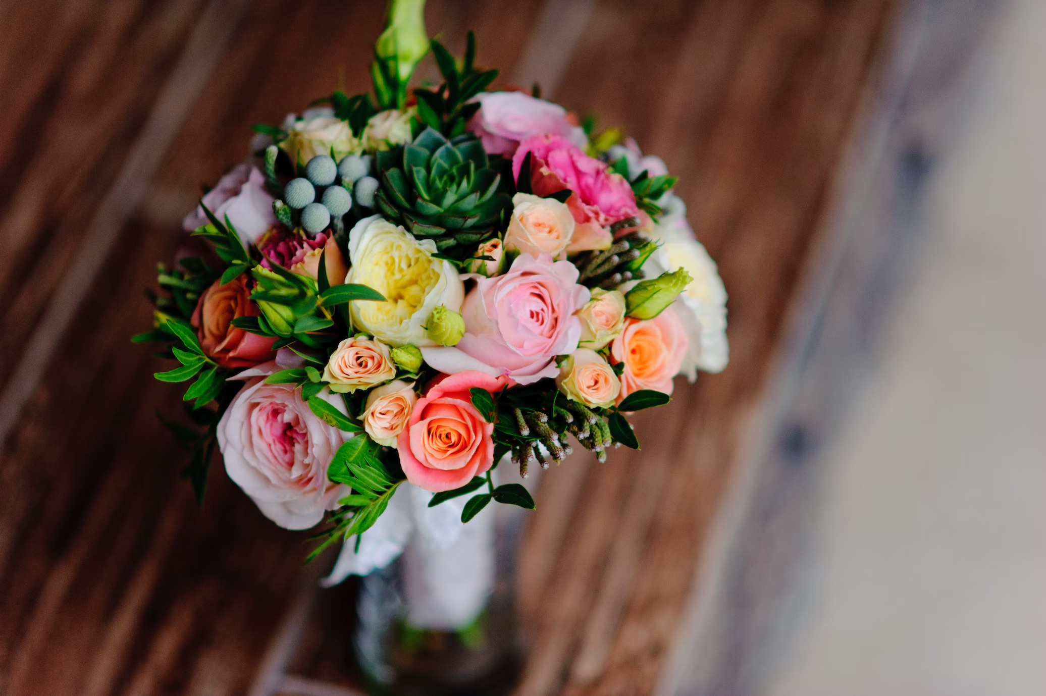 A bouquet containing colourful roses